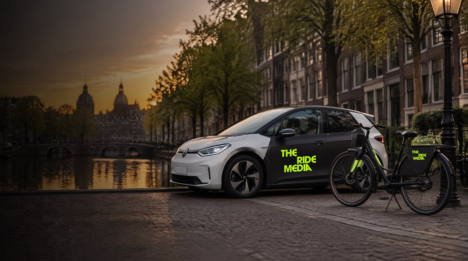 A car and a bicycle wrapped with brand advertising on an Amsterdam street